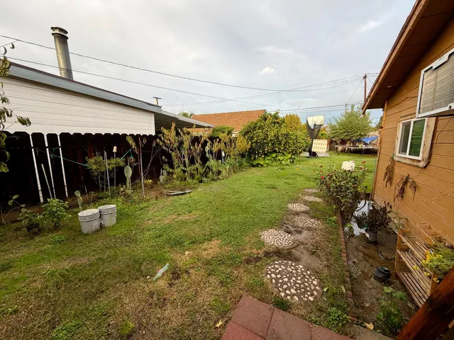 a view of a garage with a patio