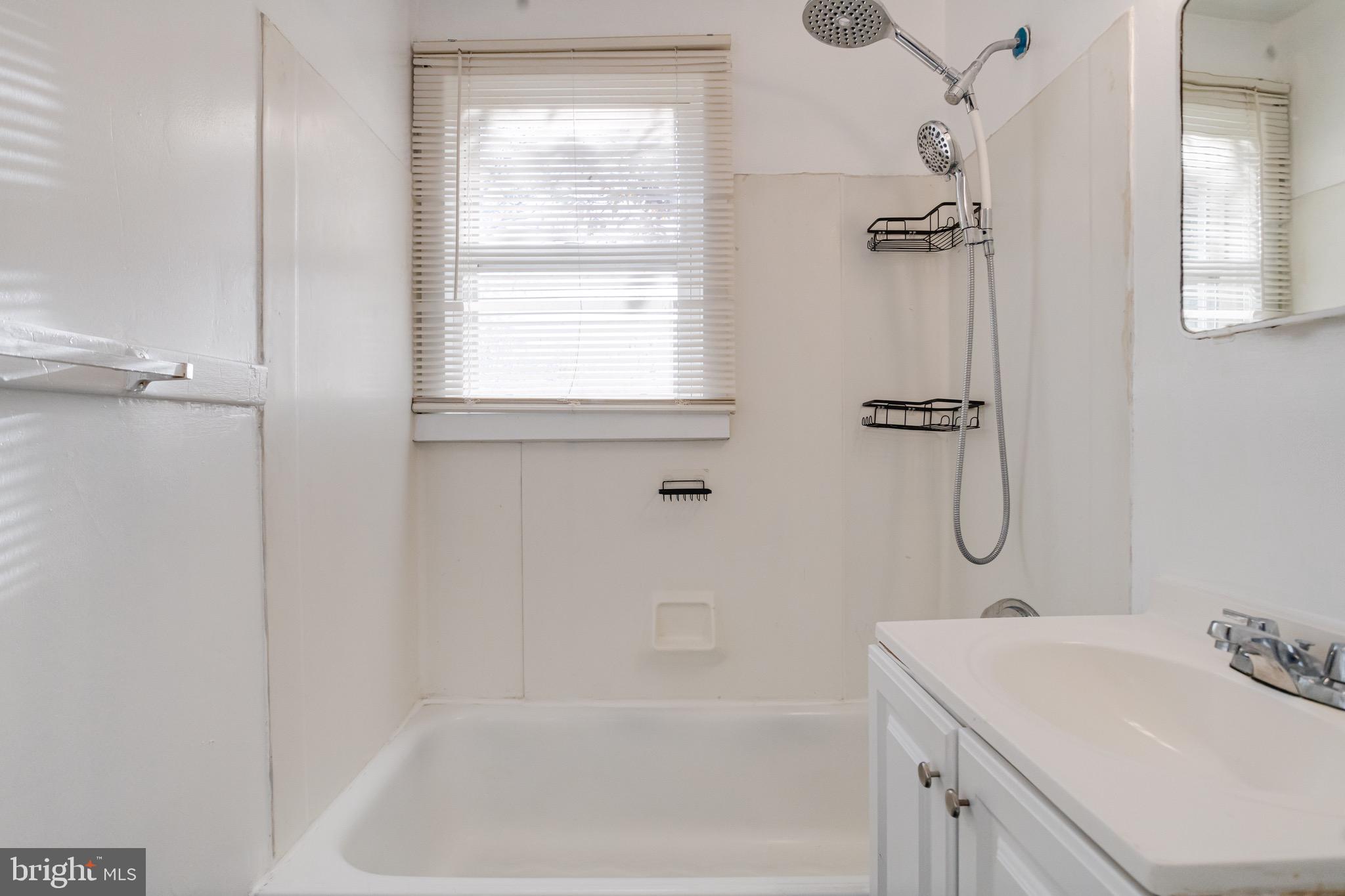 2 Chesapeake Court Aberdeen, MD 21001 - Photo 25 of 35 a bathroom with a sink vanity tub and shower