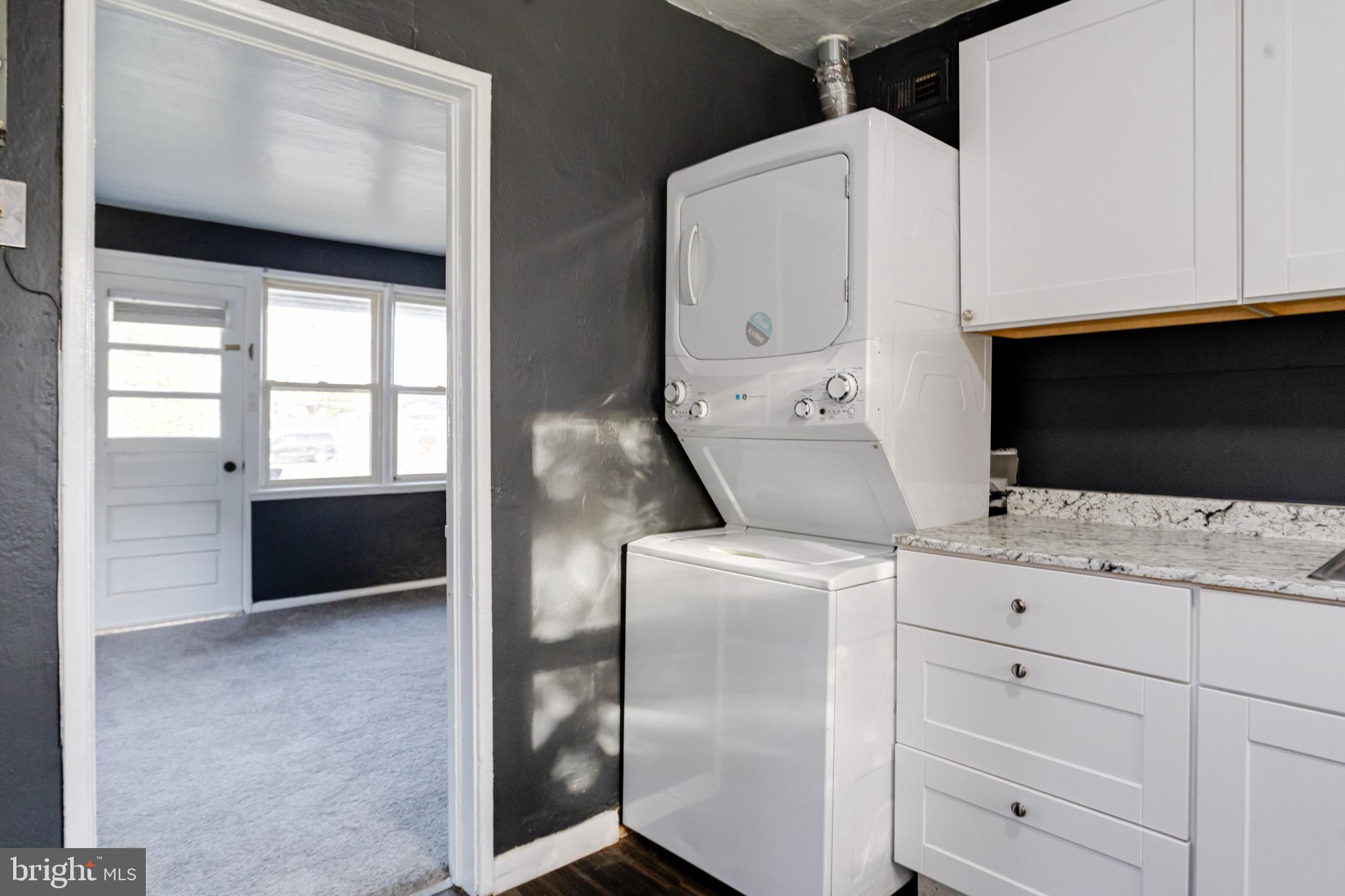 2 Chesapeake Court Aberdeen, MD 21001 - Photo 26 of 35 a kitchen with white cabinets and white appliances