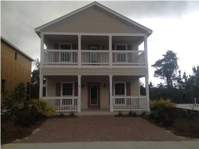 44 Barbados Ln Inlet Beach Inlet Beach, FL 32461 - Photo 1 of 1 a house with trees in front of it