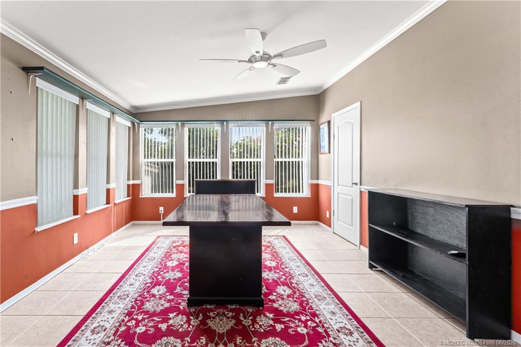 4237 4th Court Lantana, FL 33462 - Photo 19 of 40 a living room with furniture rug and window