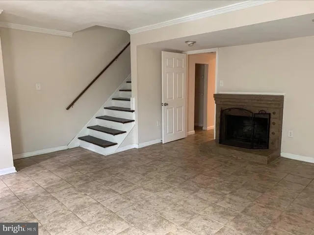 a view of a livingroom with a fireplace