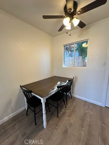 a view of a workspace with furniture