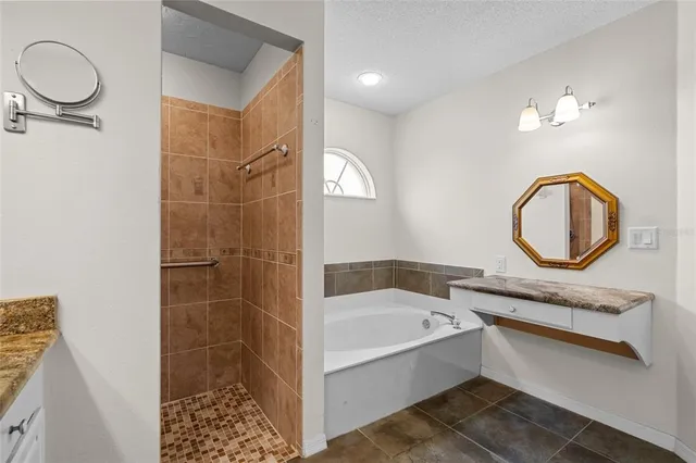 a bathroom with a double vanity sink mirror and toilet