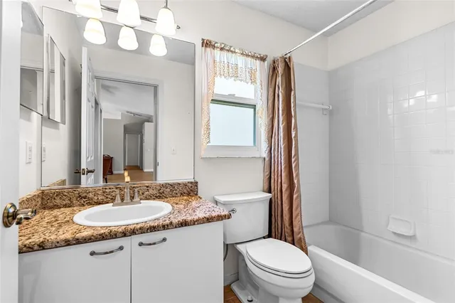 a bathroom with a bath tub and a shower