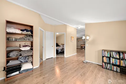 a view of a livingroom with wooden floor