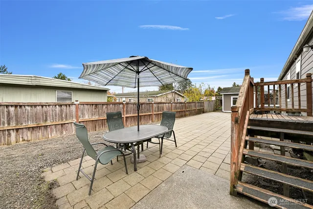 a view of a chairs and table in the terrace