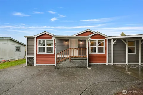 a front view of a house with a porch