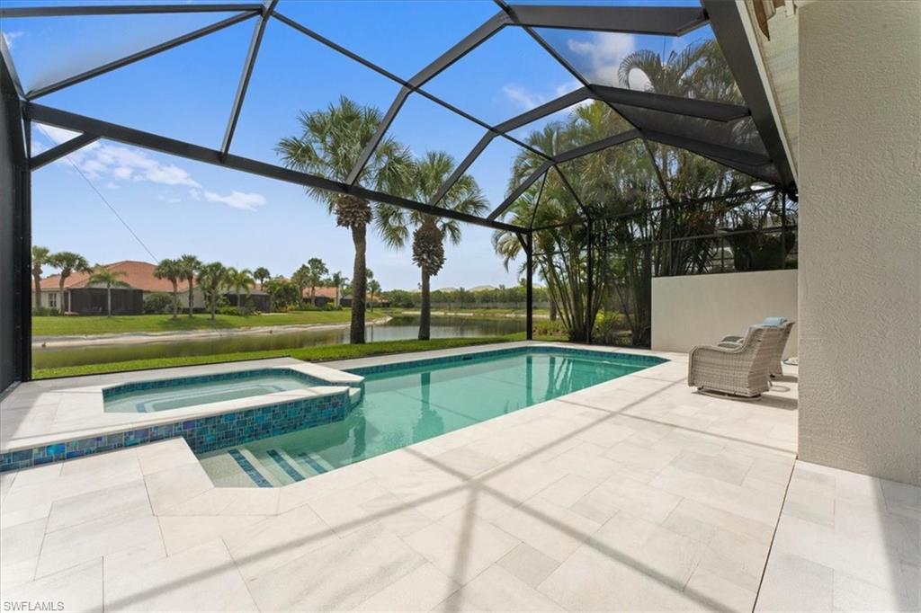 8541 Peppertree Way Naples, FL 34114 - Photo 14 of 41 a view of swimming pool with a patio