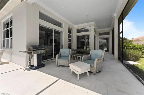 a outdoor space with patio the couches and a dining table with garden view