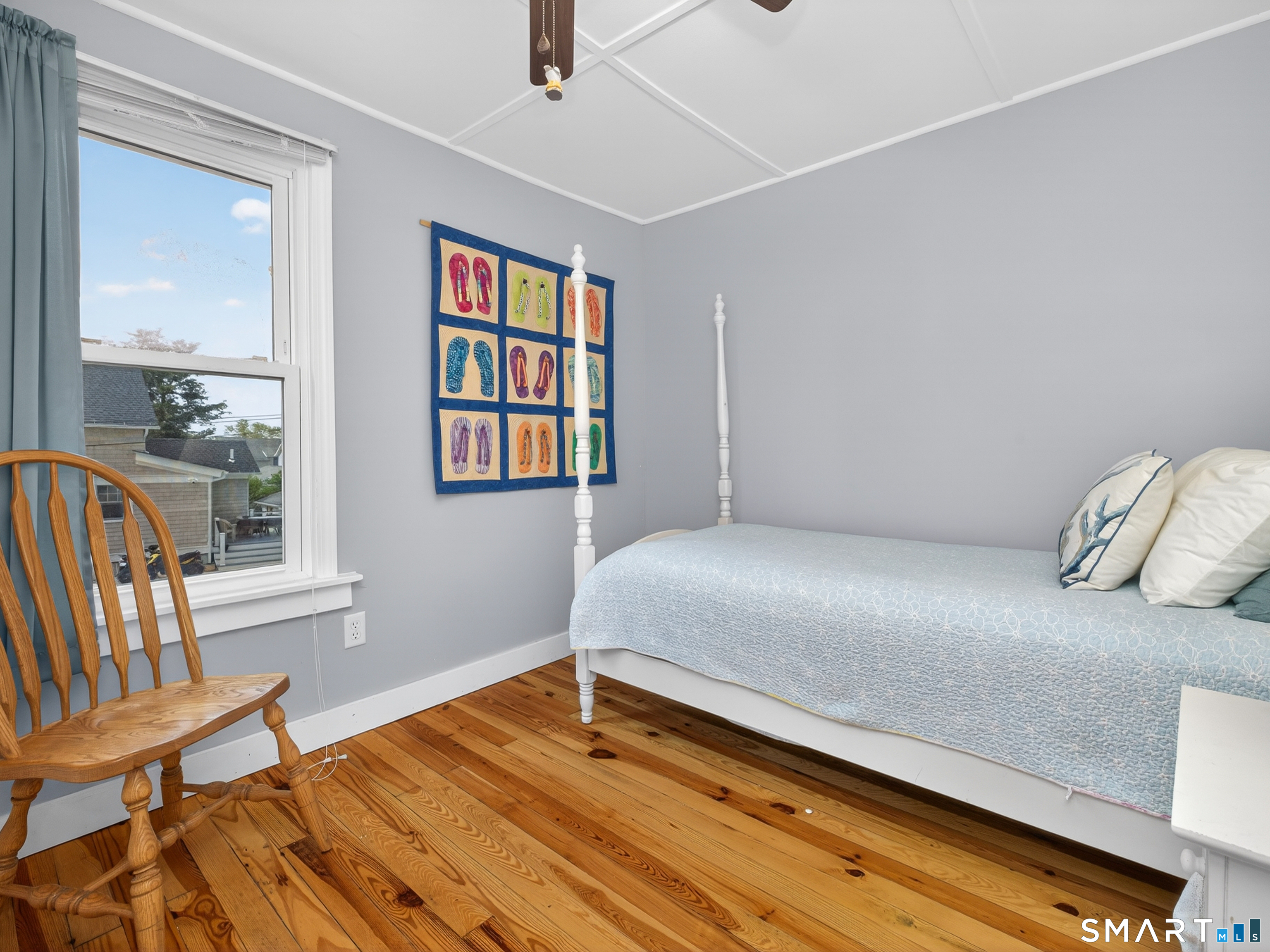 31 Old Colony Road Old Lyme, CT 06371 - Photo 24 of 38 a bedroom with a bed and a window