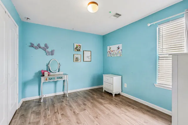 a room with furniture and a window