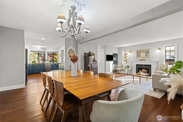 a living room with furniture and large windows