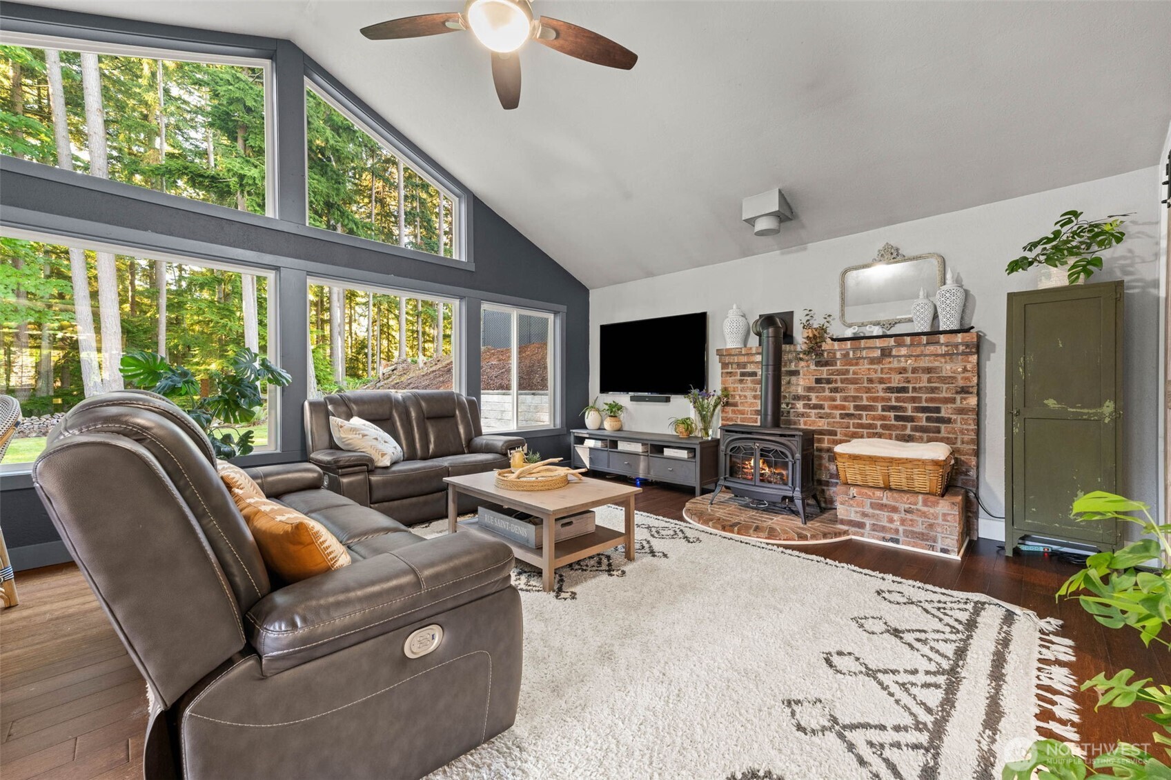 9630 50th Place West Mukilteo, WA 98275 - Photo 15 of 39 a living room with furniture and a flat screen tv