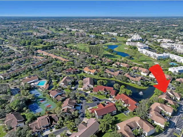 a metallic refrigerator freezer sitting in a kitchen