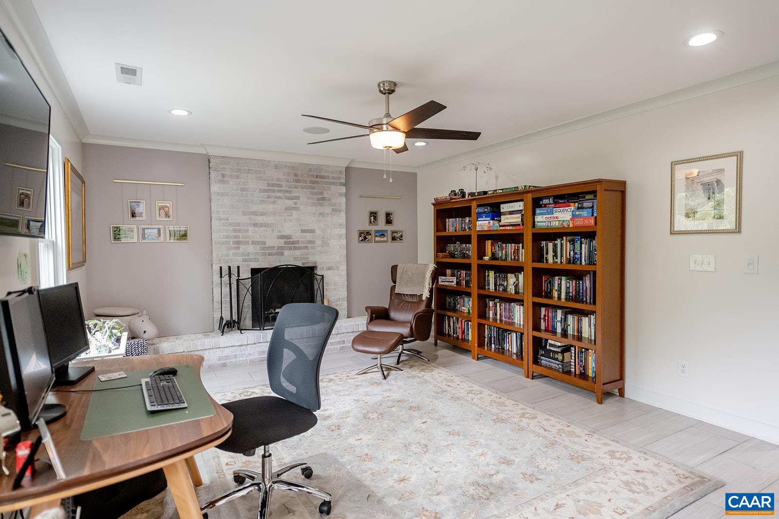 728 Shamrock Road Charlottesville, VA 22903 - Photo 19 of 35 a workspace with a bookshelf