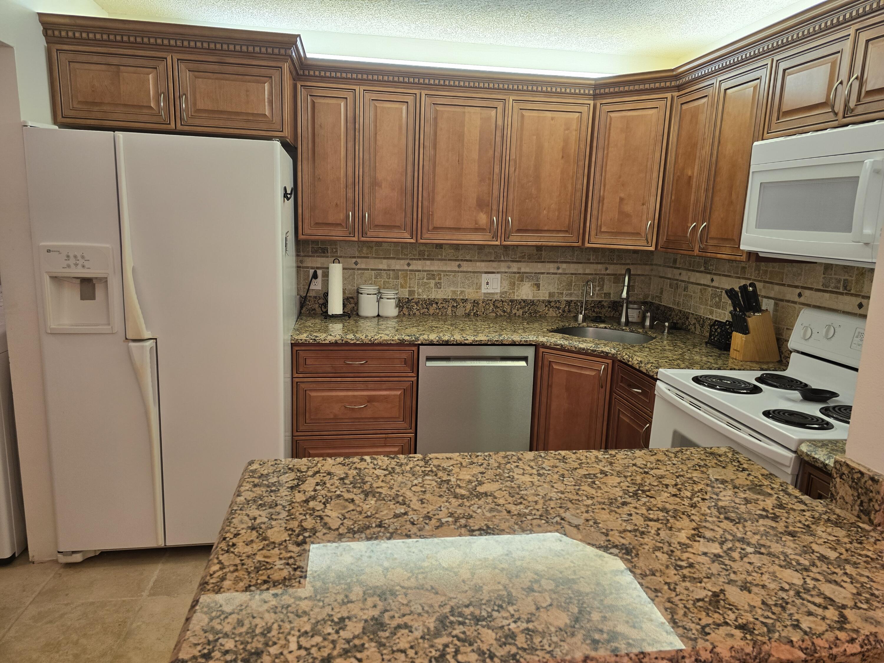 317 Pine Ridge Circle Greenacres, FL 33463 - Photo 2 of 51 kitchen