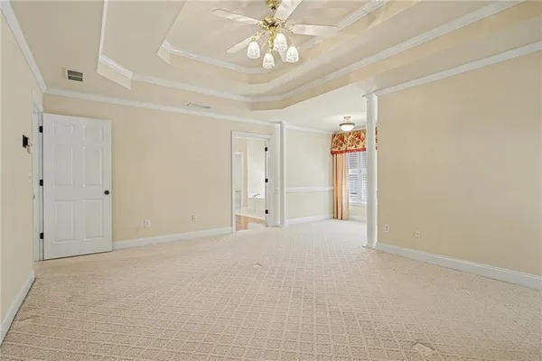 a spacious bathroom with a tub shower and sink