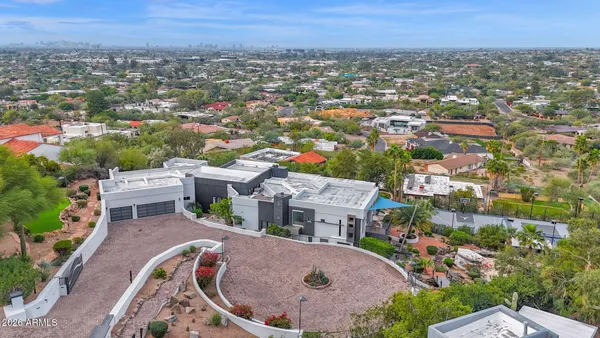 an aerial view of a house with a garden