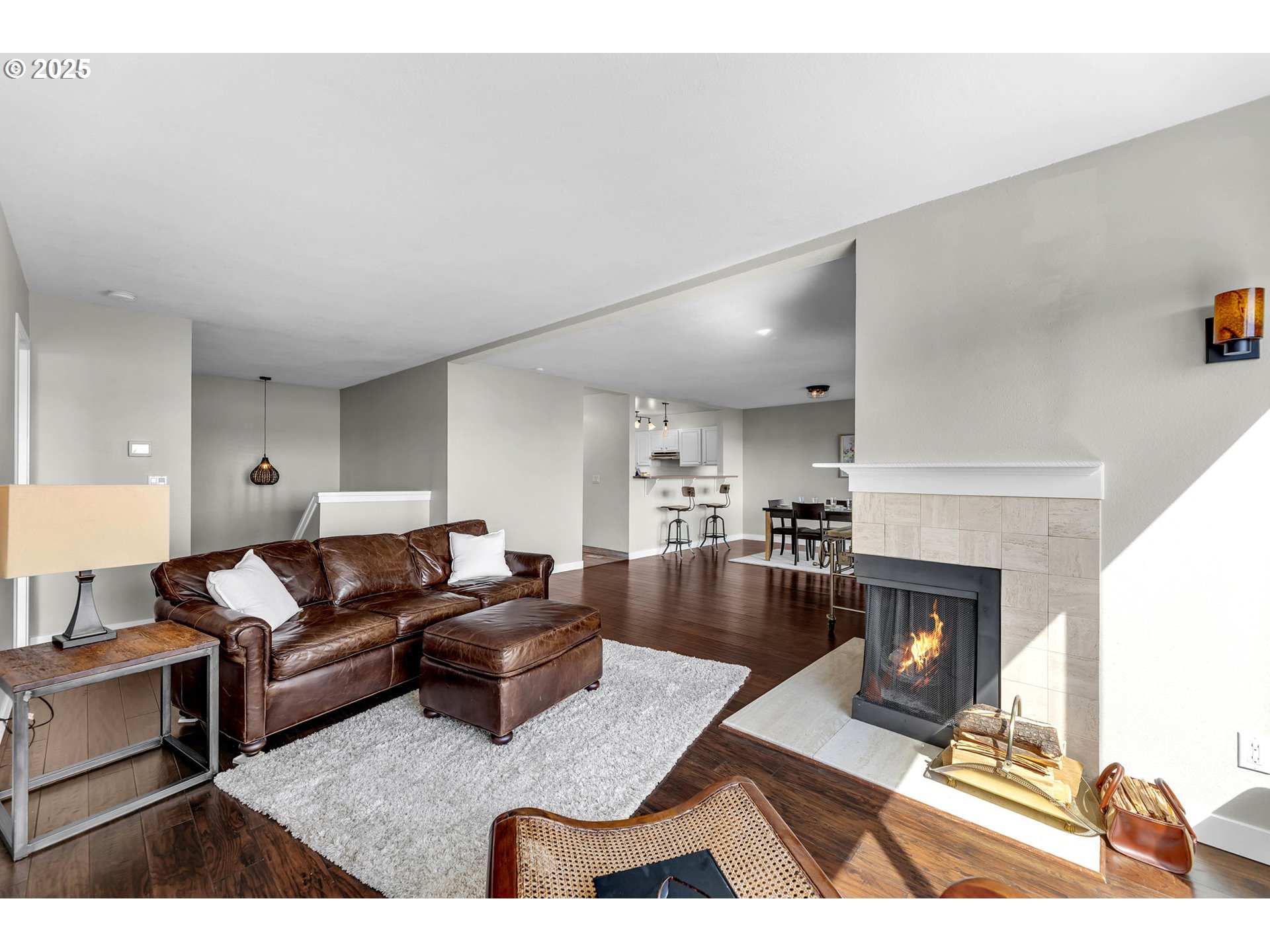 6902 Southeast Riverside Drive, Unit 6 Vancouver, WA 98664 - Photo 20 of 39 a living room with furniture and a fireplace