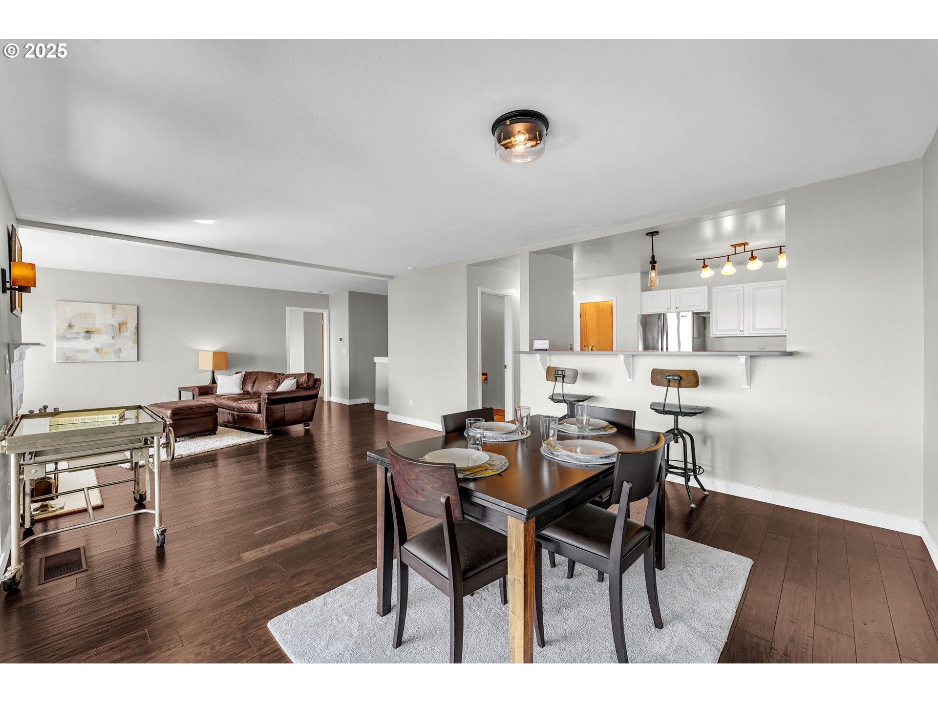 6902 Southeast Riverside Drive, Unit 6 Vancouver, WA 98664 - Photo 21 of 39 a view of a dining room with furniture and wooden floor