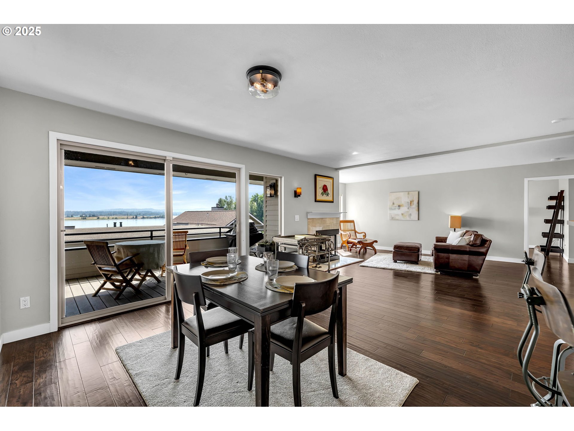 6902 Southeast Riverside Drive, Unit 6 Vancouver, WA 98664 - Photo 22 of 39 a living room with furniture and wooden floor