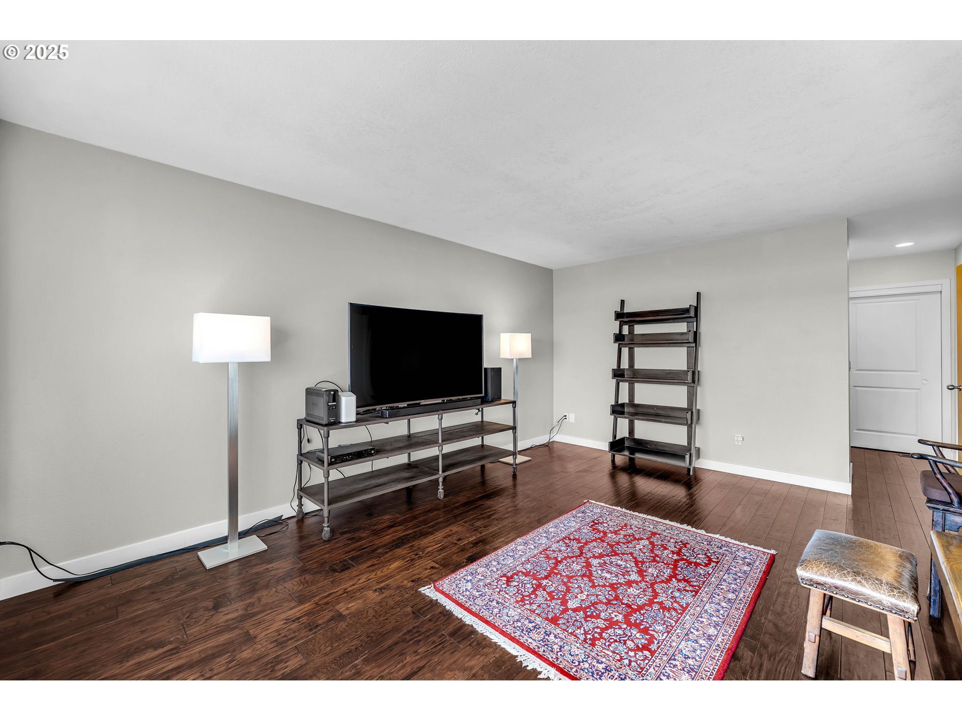 6902 Southeast Riverside Drive, Unit 6 Vancouver, WA 98664 - Photo 32 of 39 a living room with furniture and a flat screen tv