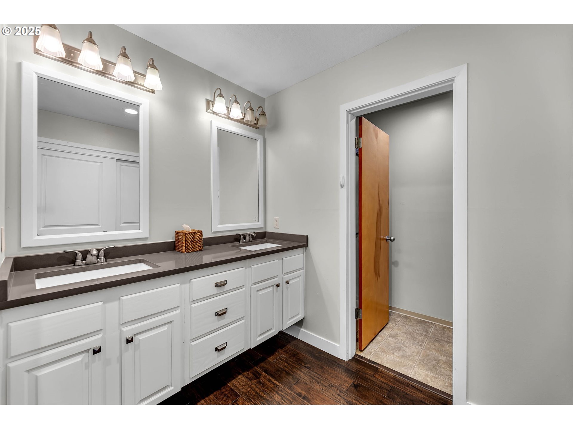 6902 Southeast Riverside Drive, Unit 6 Vancouver, WA 98664 - Photo 33 of 39 a bathroom with double sink and a mirror