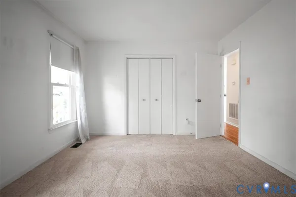 a bathroom with a toilet and a sink