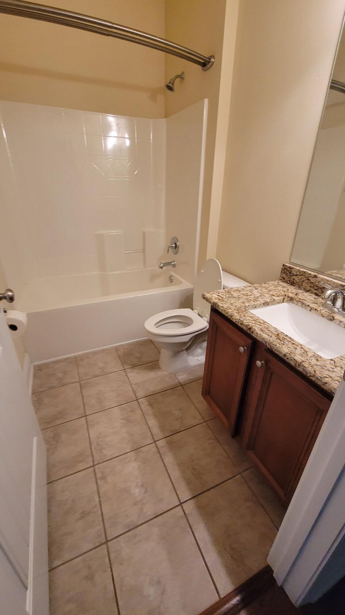 1058 Cocobolo Drive Santa Rosa Beach, FL 32459 - Photo 13 of 26 a bathroom with a granite countertop sink a toilet and shower