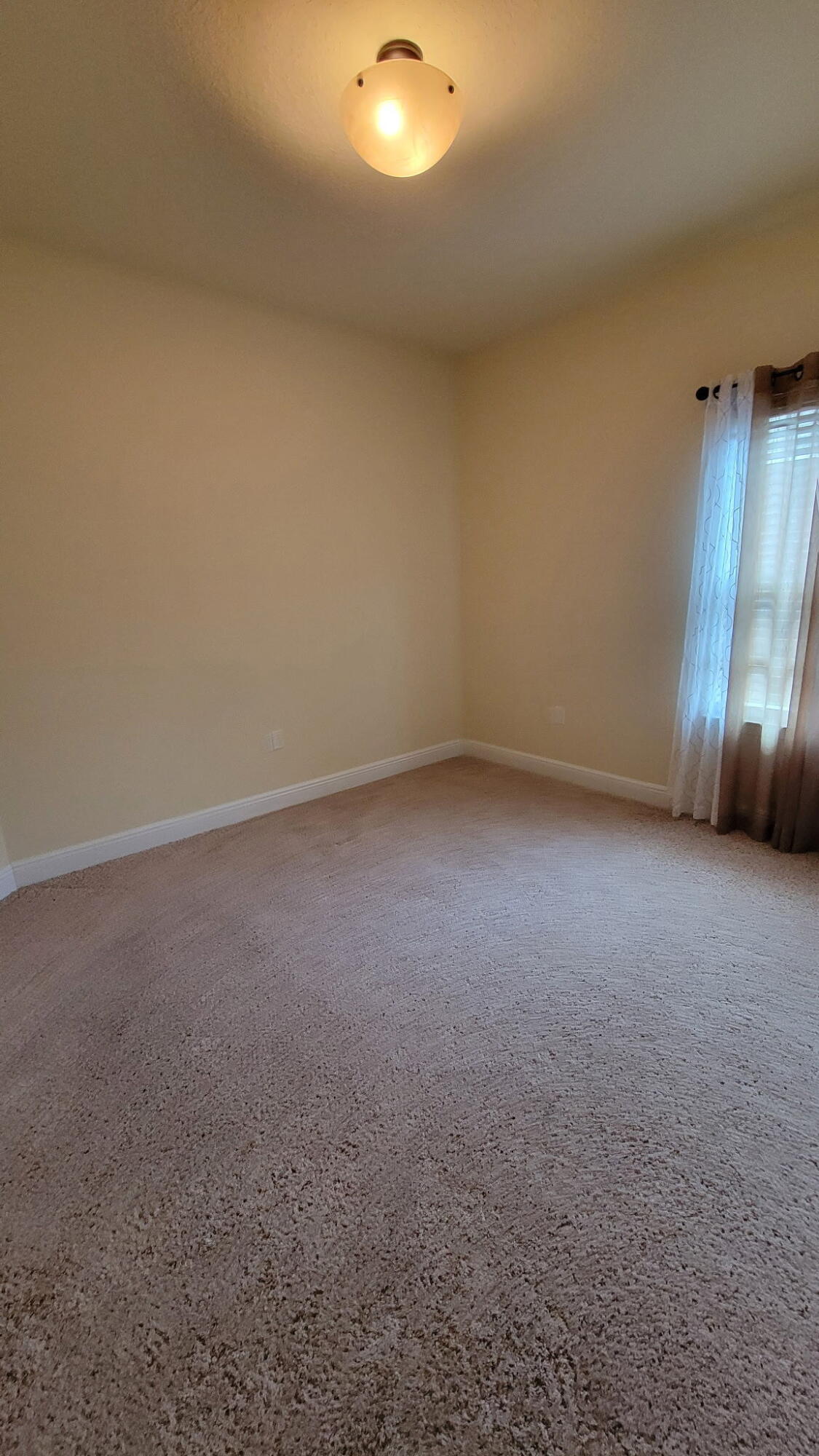 1058 Cocobolo Drive Santa Rosa Beach, FL 32459 - Photo 14 of 26 a view of an empty room and a window