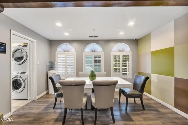 a view of a dining room with furniture window and outside view