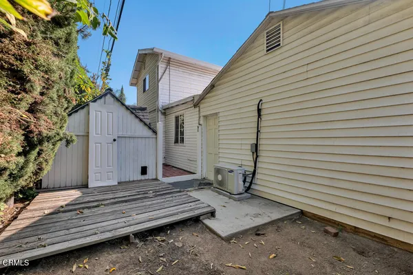 a house view with a outdoor space