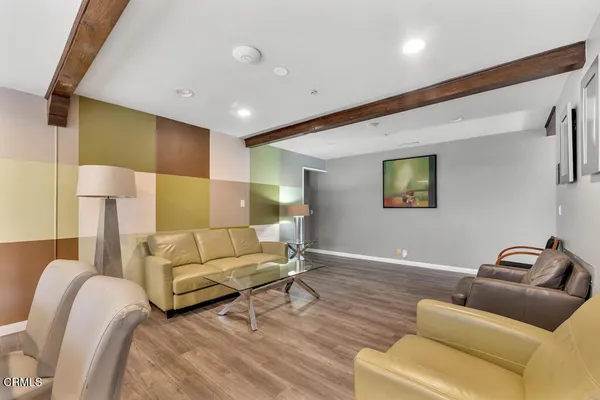 a living room with furniture and a couch