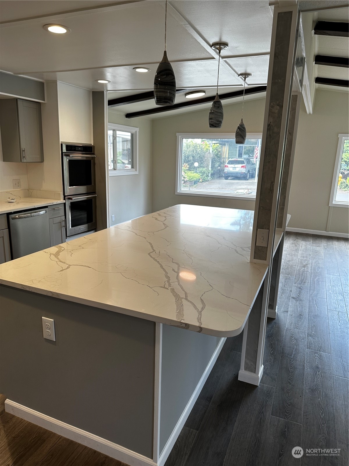 201 Union Avenue Southeast, Unit 90 Renton, WA 98059 - Photo 12 of 22 a view of a kitchen counter space and stainless steel appliances