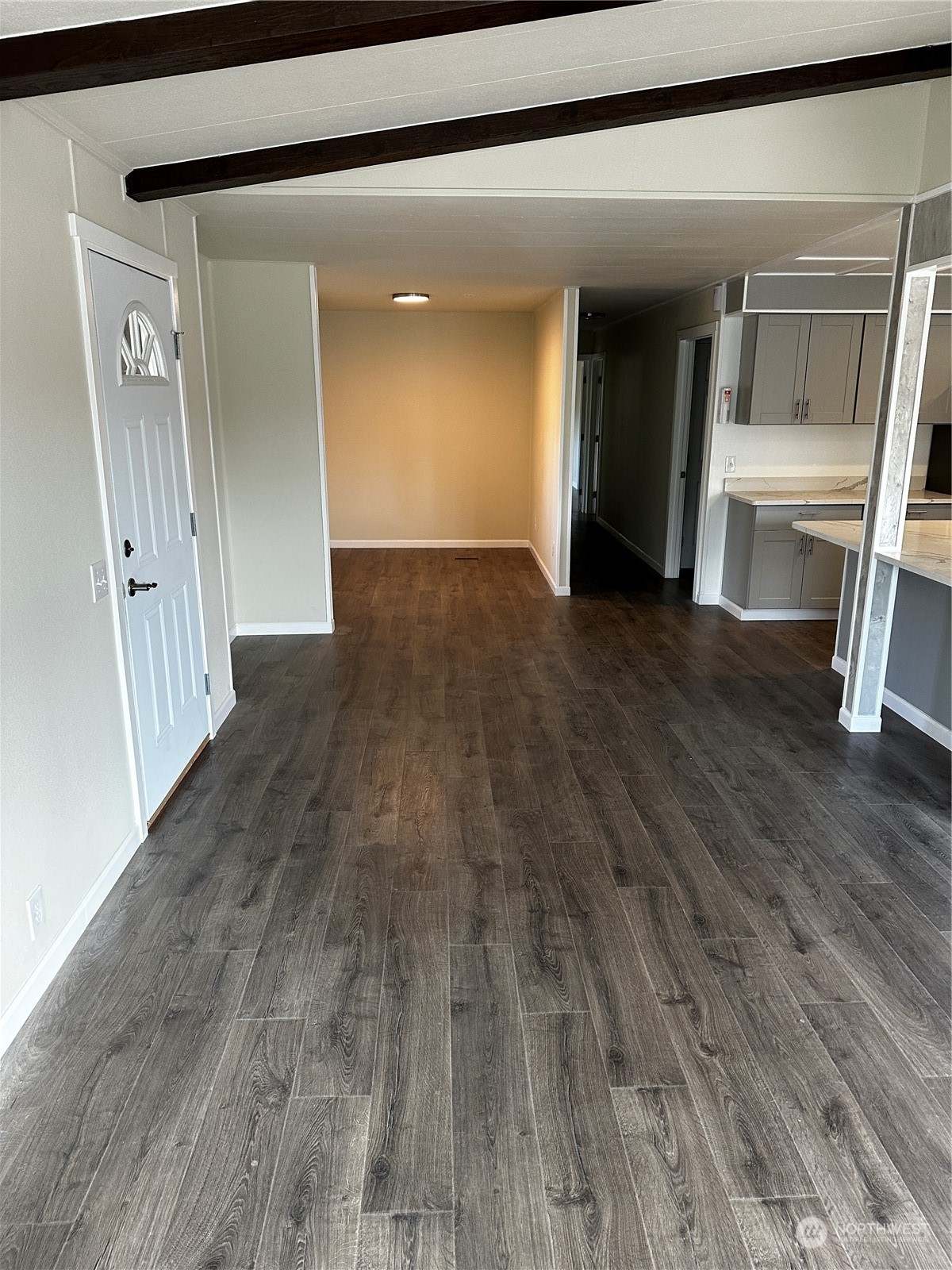 201 Union Avenue Southeast, Unit 90 Renton, WA 98059 - Photo 3 of 22 a view of a hallway view with wooden floor and staircase