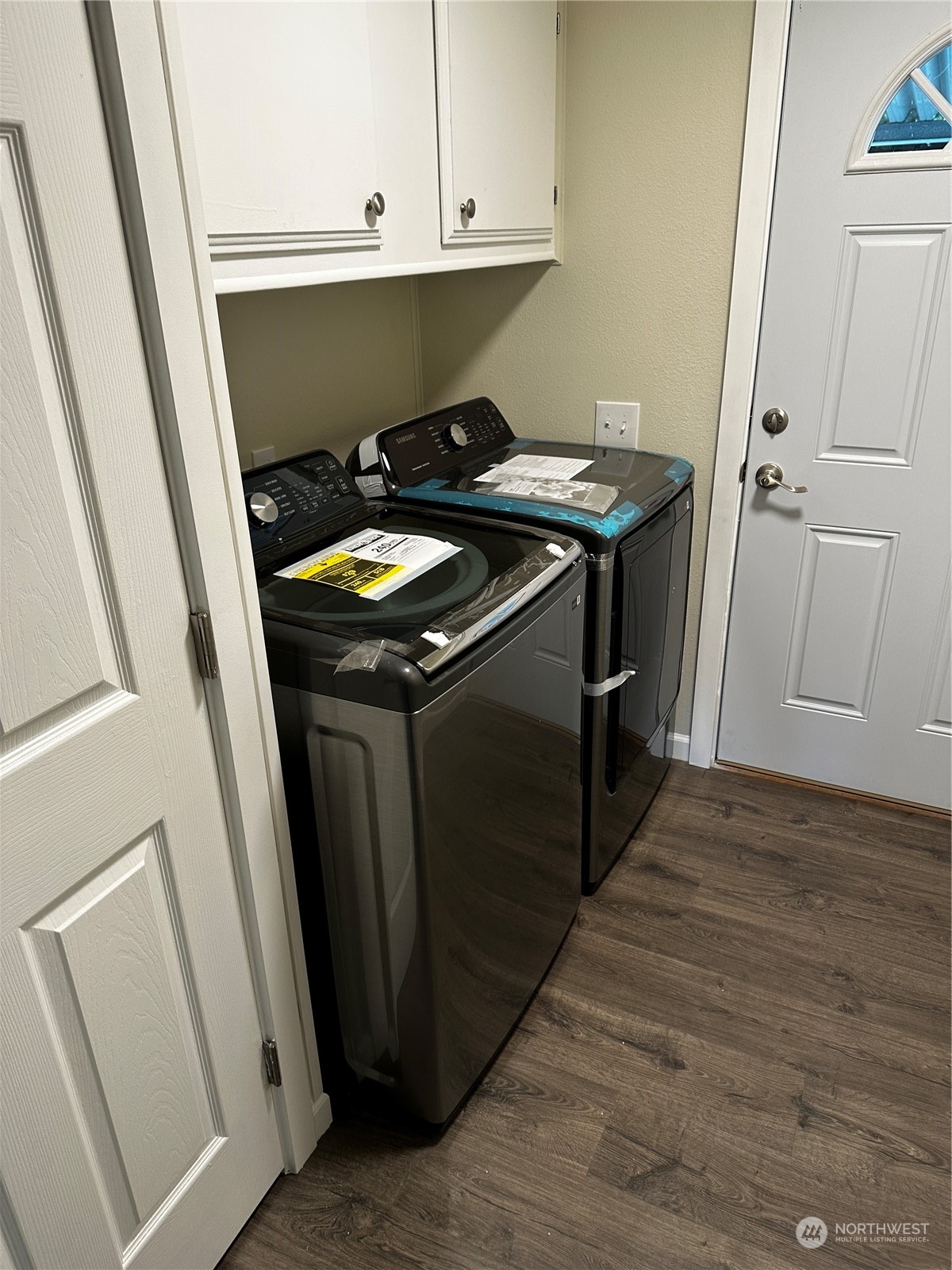 201 Union Avenue Southeast, Unit 90 Renton, WA 98059 - Photo 10 of 22 a utility room with wooden floor washer and dryer