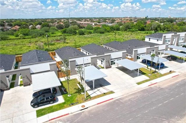 an aerial view of a house with garden space and outdoor space
