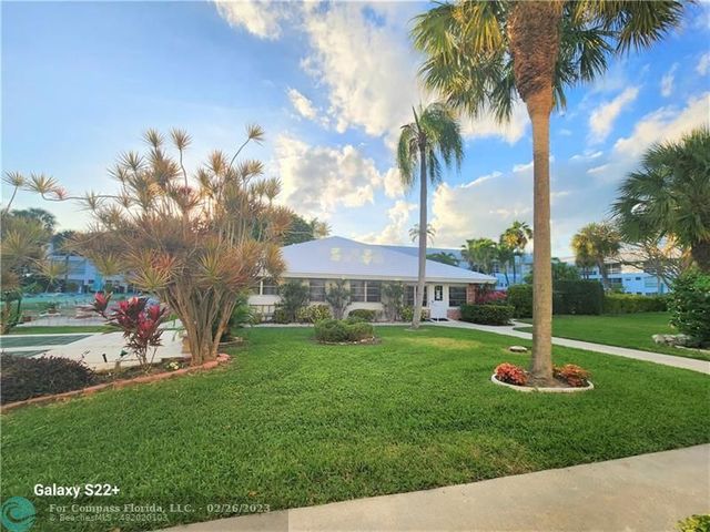 a view of a park with a slide