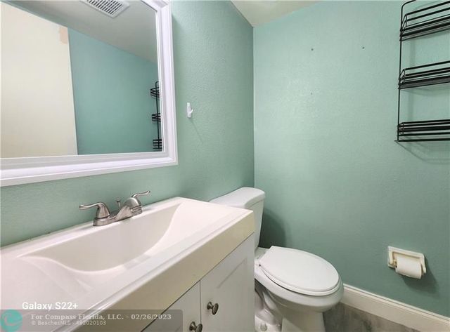 a bathroom with a sink and a toilet