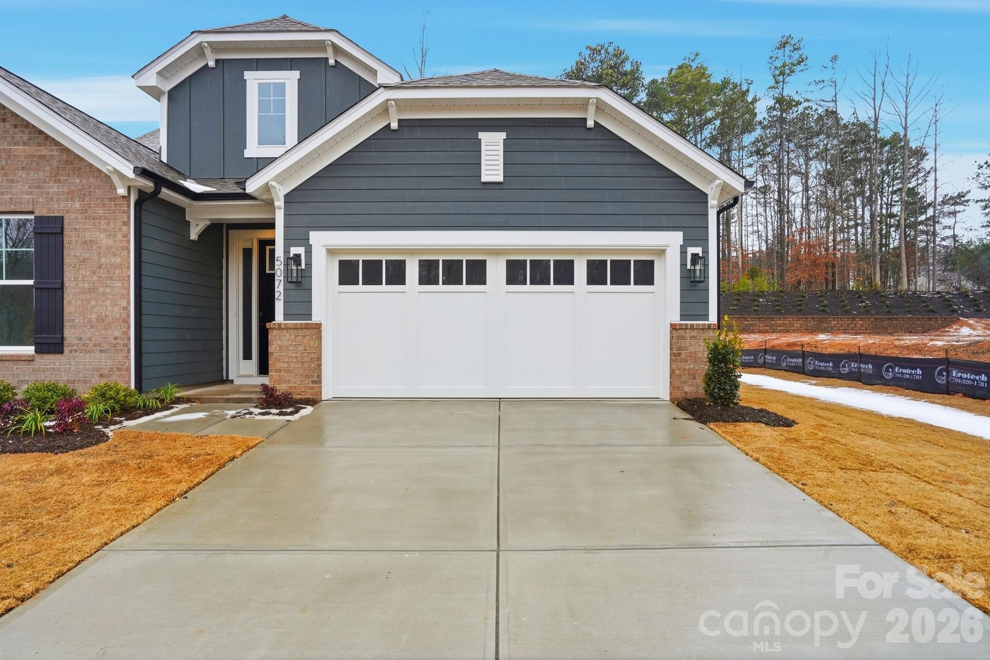 5072 Mclaughlin Loop Waxhaw, NC 28173 - Photo 2 of 46 a house view with a outdoor space