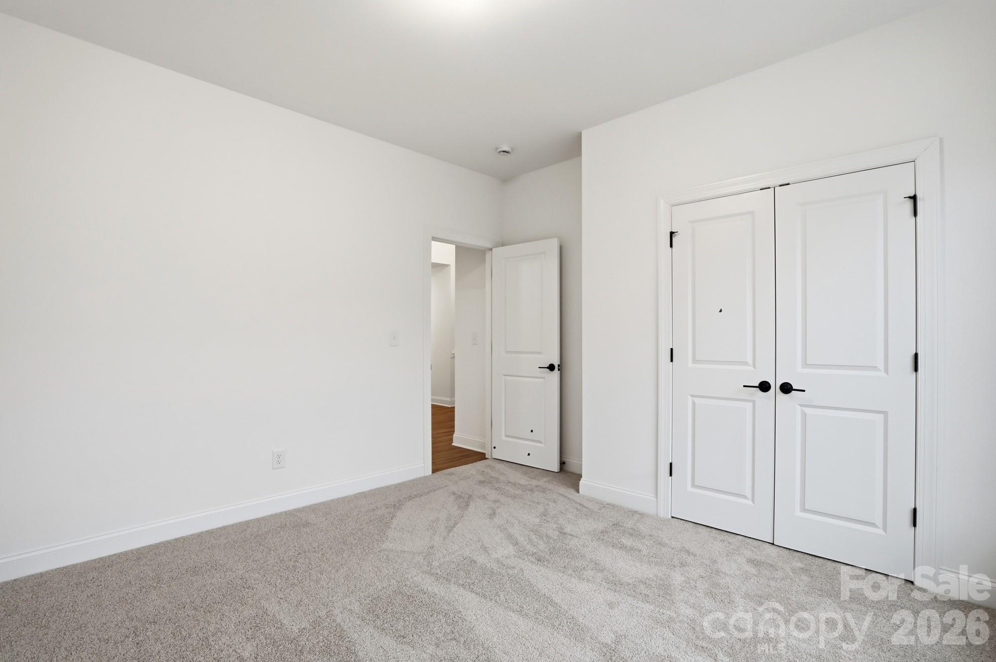 5072 Mclaughlin Loop Waxhaw, NC 28173 - Photo 28 of 46 a view of an empty room