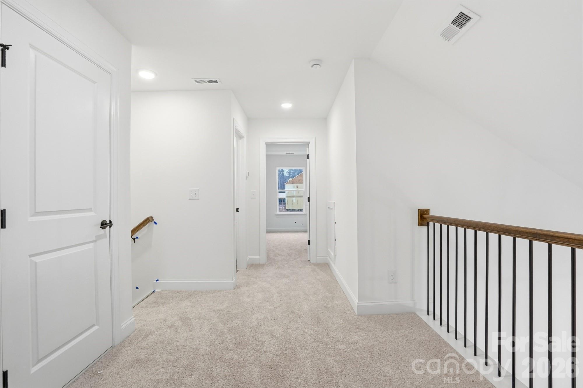 5072 Mclaughlin Loop Waxhaw, NC 28173 - Photo 34 of 46 a view of a hallway