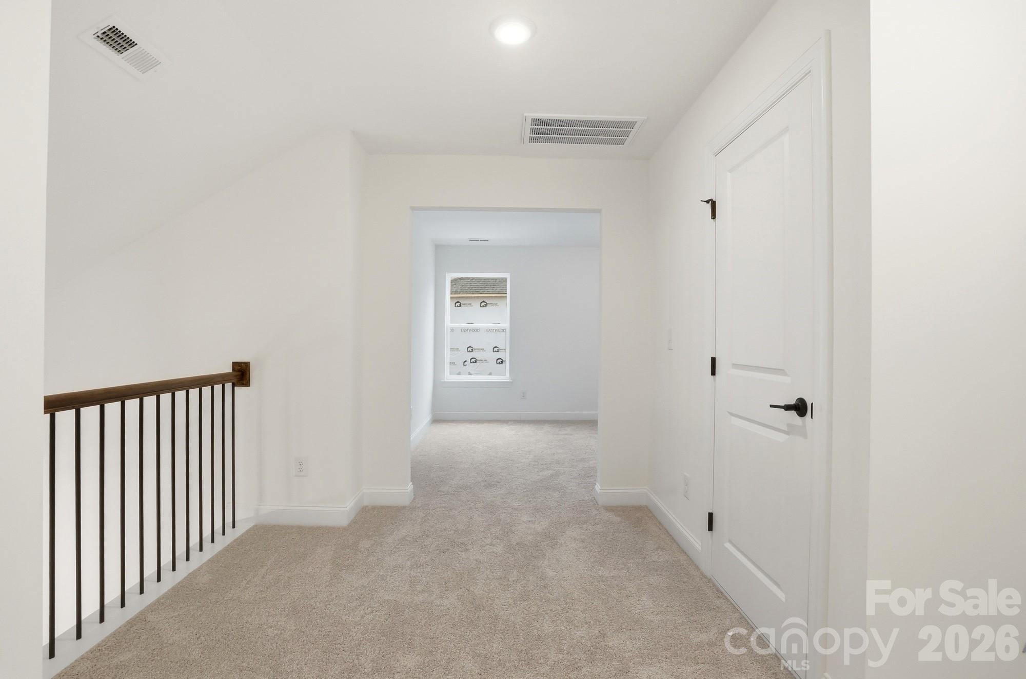 5072 Mclaughlin Loop Waxhaw, NC 28173 - Photo 37 of 46 a view of a hallway