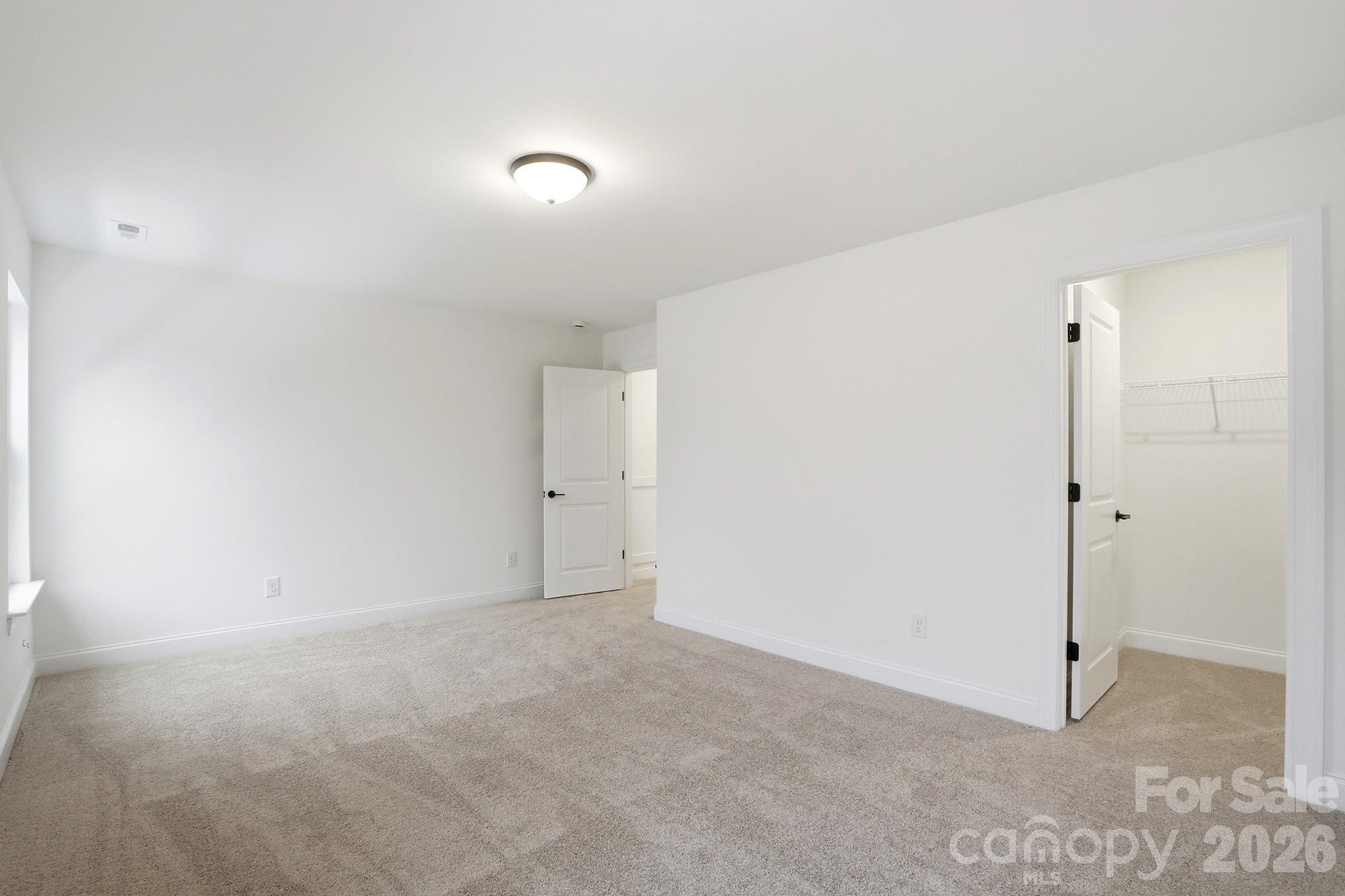 5072 Mclaughlin Loop Waxhaw, NC 28173 - Photo 39 of 46 a view of an empty room