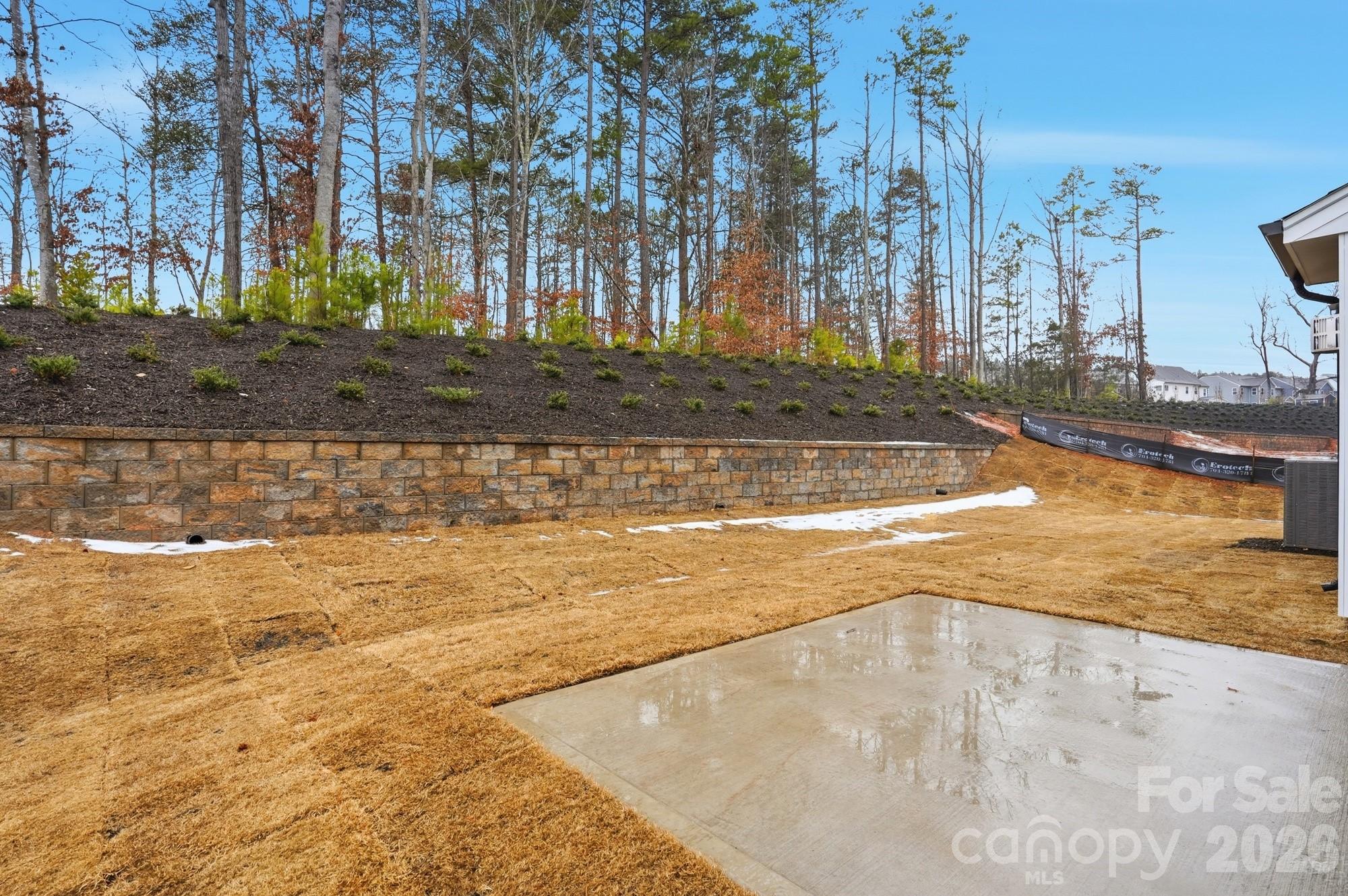 5072 Mclaughlin Loop Waxhaw, NC 28173 - Photo 45 of 46 a view of a backyard of the house