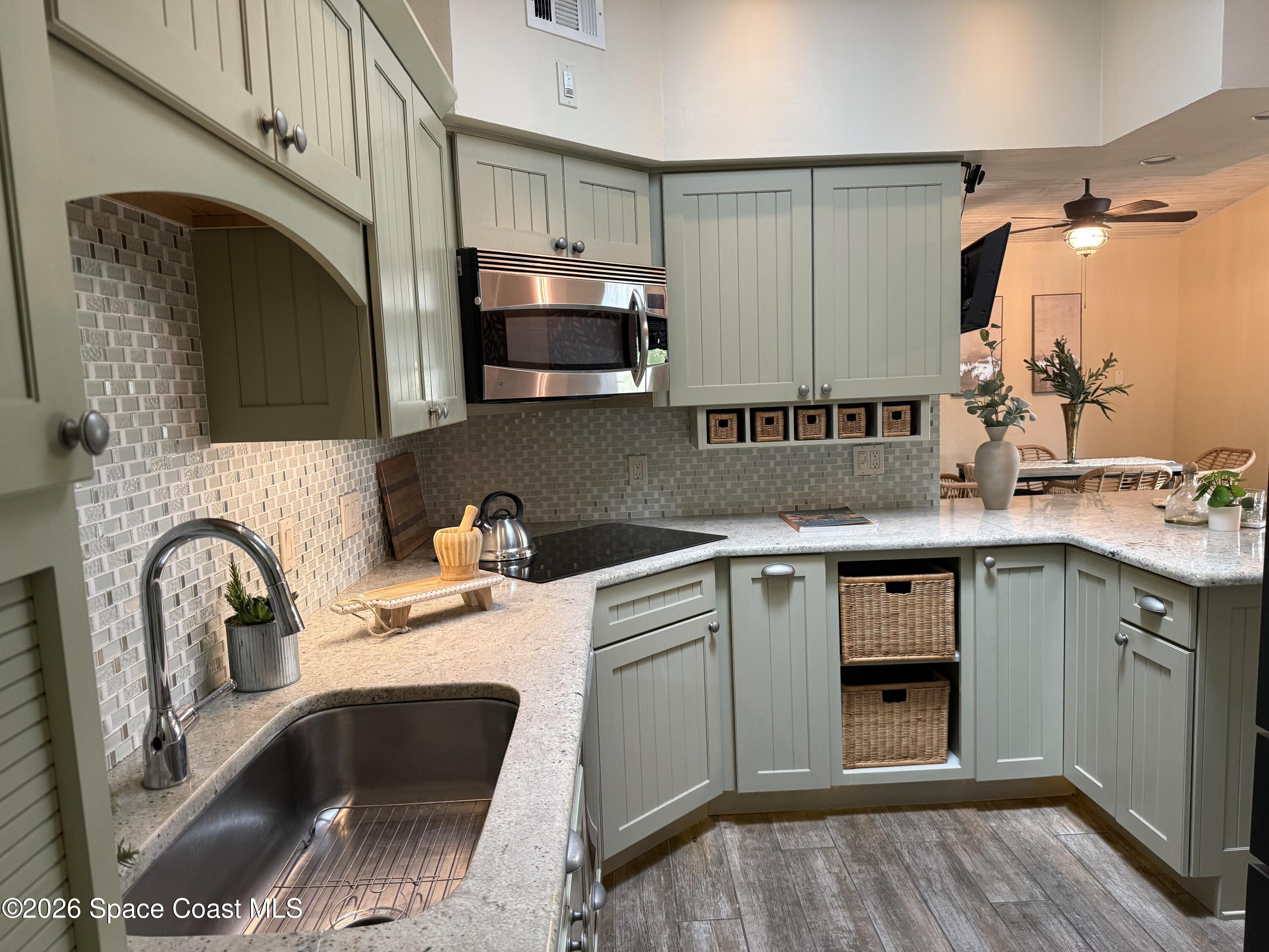 331 Avenida Del Sol Indialantic, FL 32903 - Photo 11 of 51 a kitchen with a sink cabinets and appliances