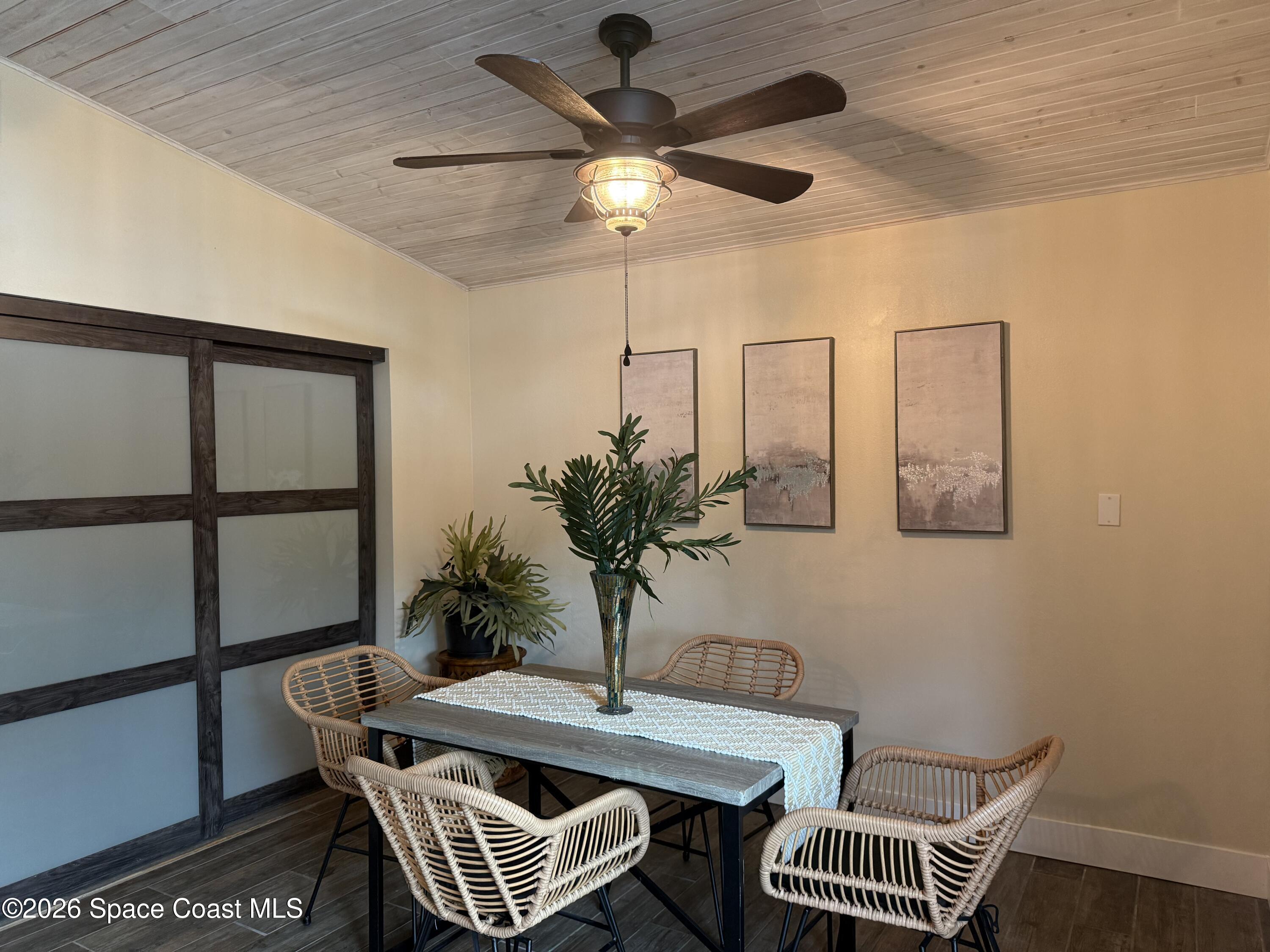 331 Avenida Del Sol Indialantic, FL 32903 - Photo 21 of 51 a view of a livingroom with furniture and a potted plant