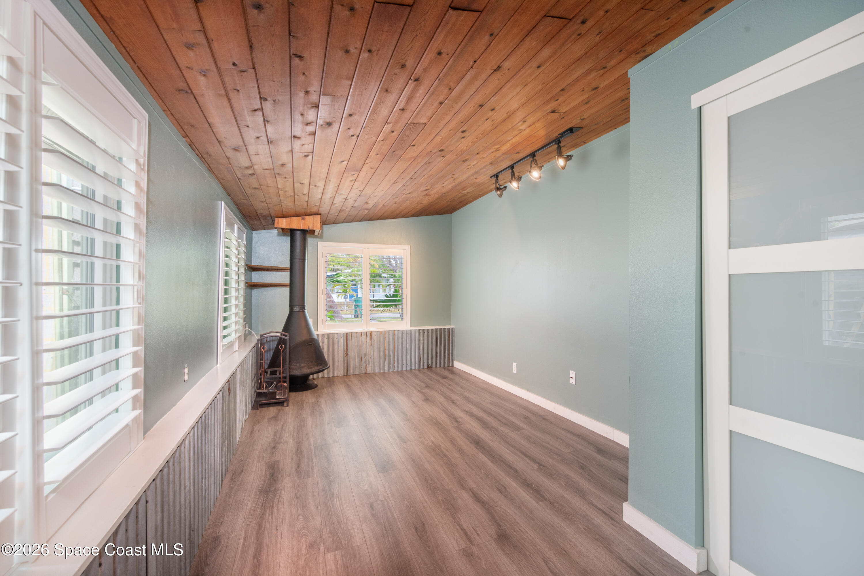 331 Avenida Del Sol Indialantic, FL 32903 - Photo 23 of 51 a view of empty room with wooden floor and fan