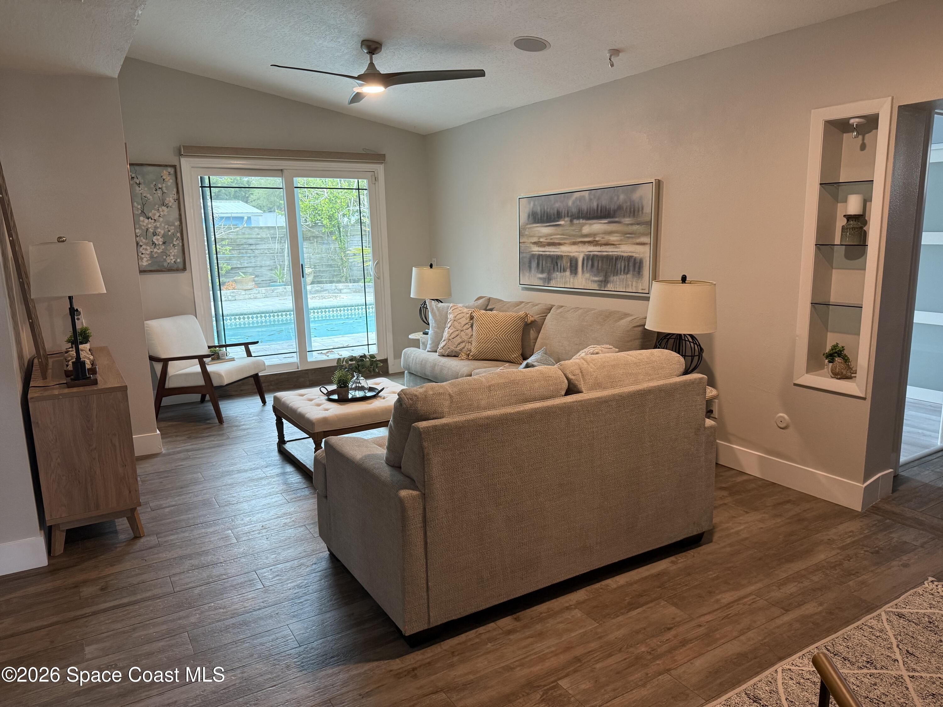 331 Avenida Del Sol Indialantic, FL 32903 - Photo 25 of 51 a living room with furniture and a large window